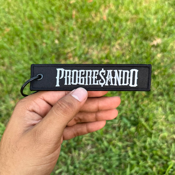 Black PROGRE$ANDO Keychain